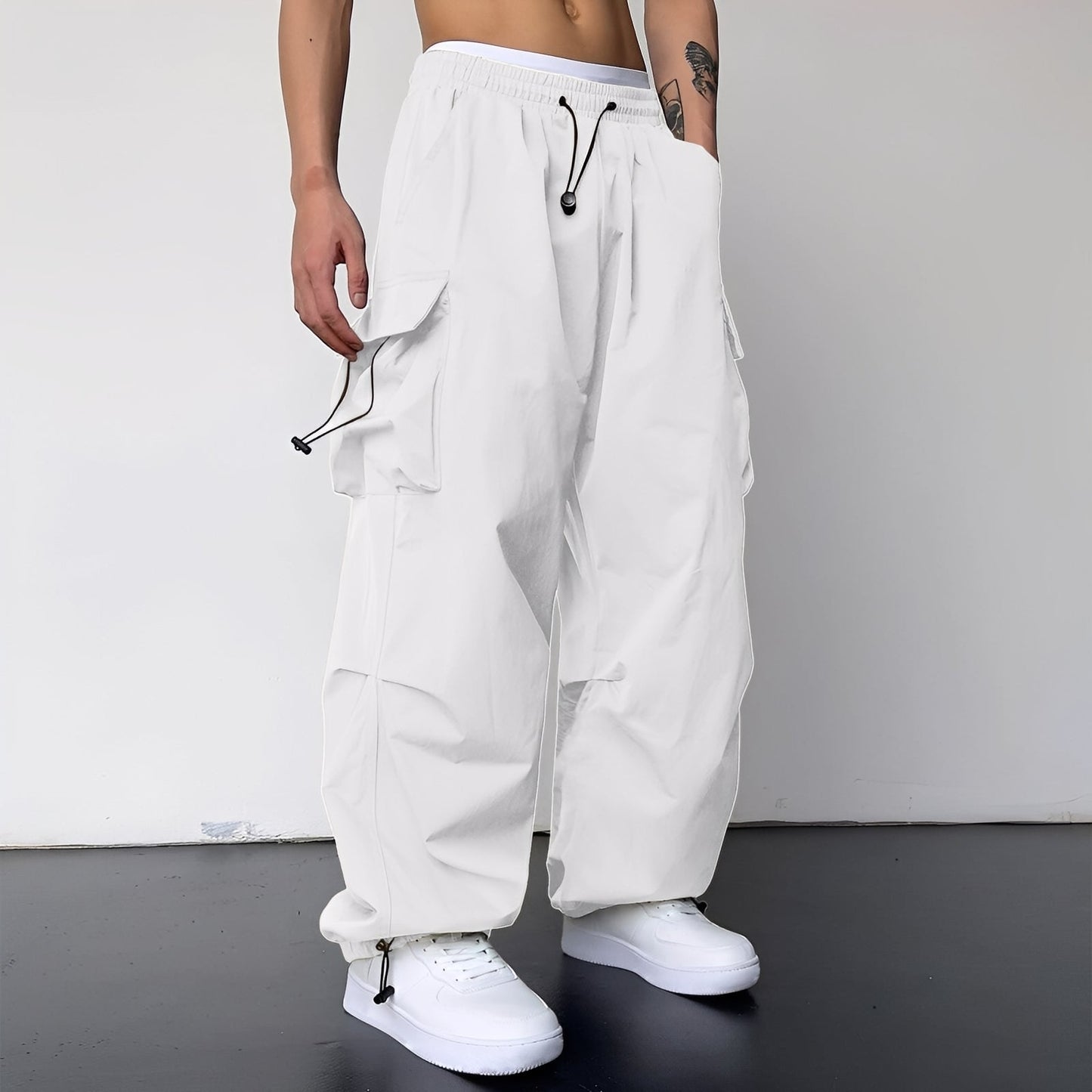 Kaleb - Modne męskie spodnie typu cargo baggy