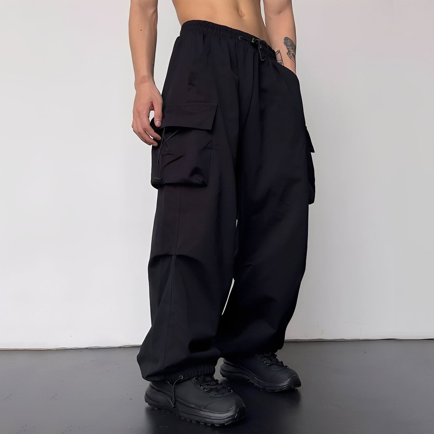 Kaleb - Modne męskie spodnie typu cargo baggy