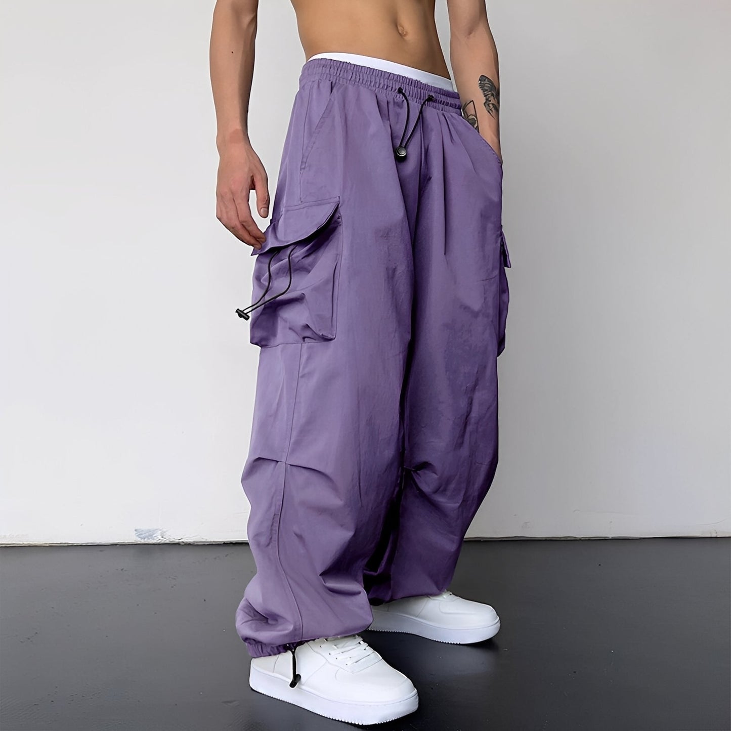 Kaleb - Modne męskie spodnie typu cargo baggy