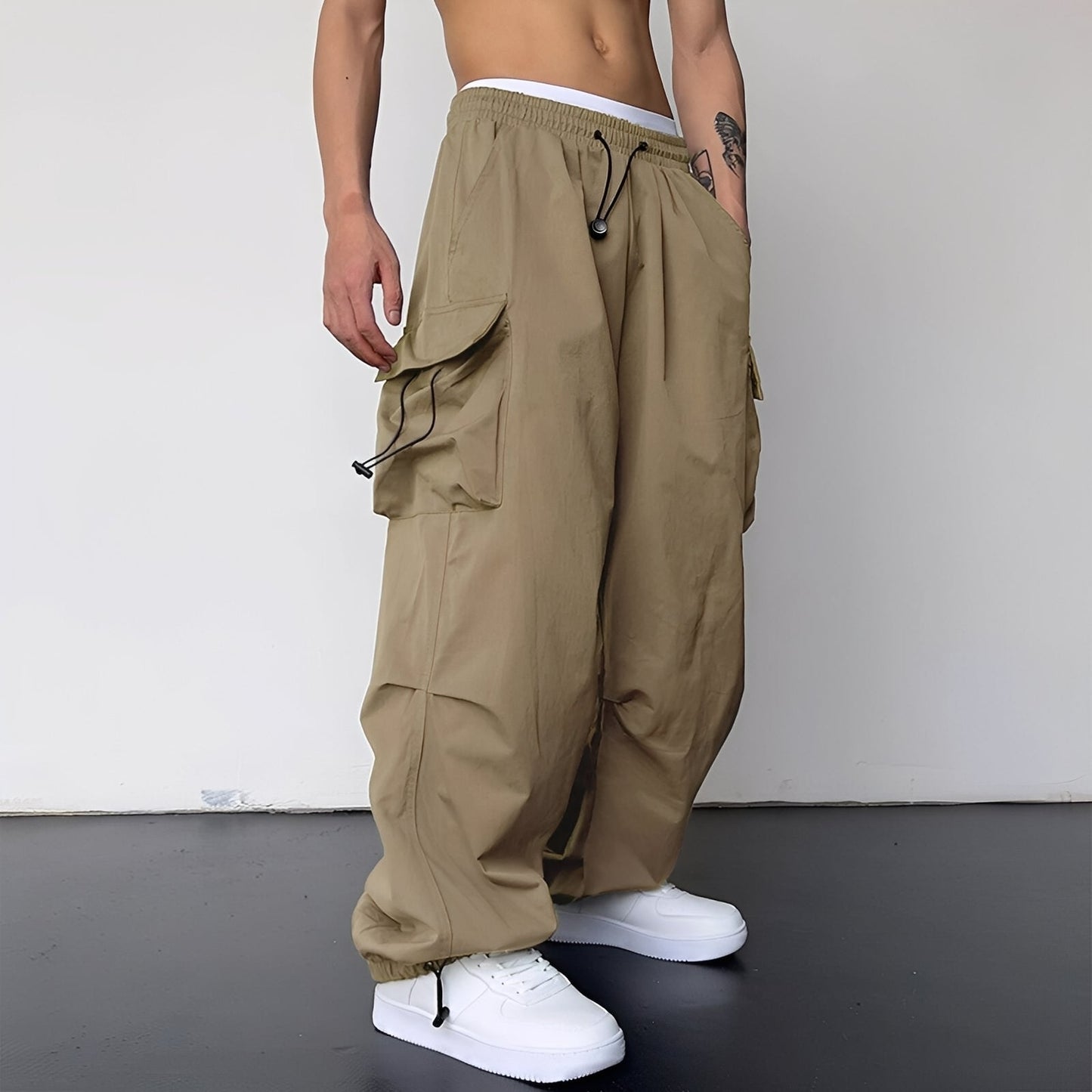 Kaleb - Modne męskie spodnie typu cargo baggy
