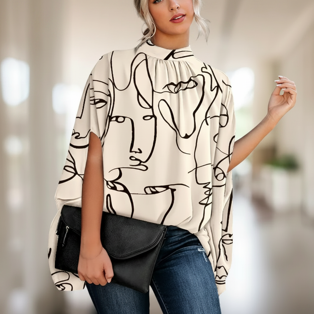 Jasmaine - Elegancka Rozkloszowana Bluzka