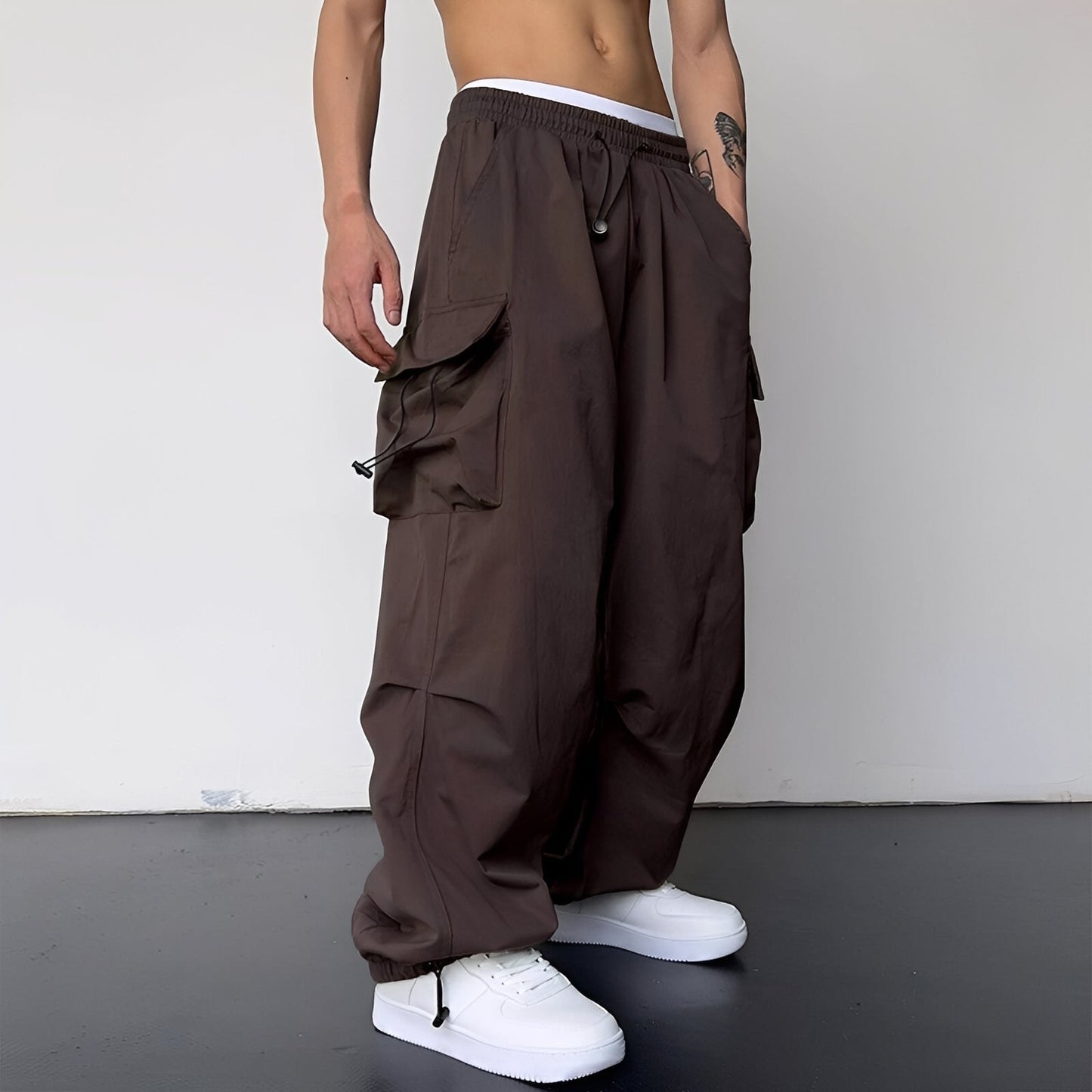 Kaleb - Modne męskie spodnie typu cargo baggy
