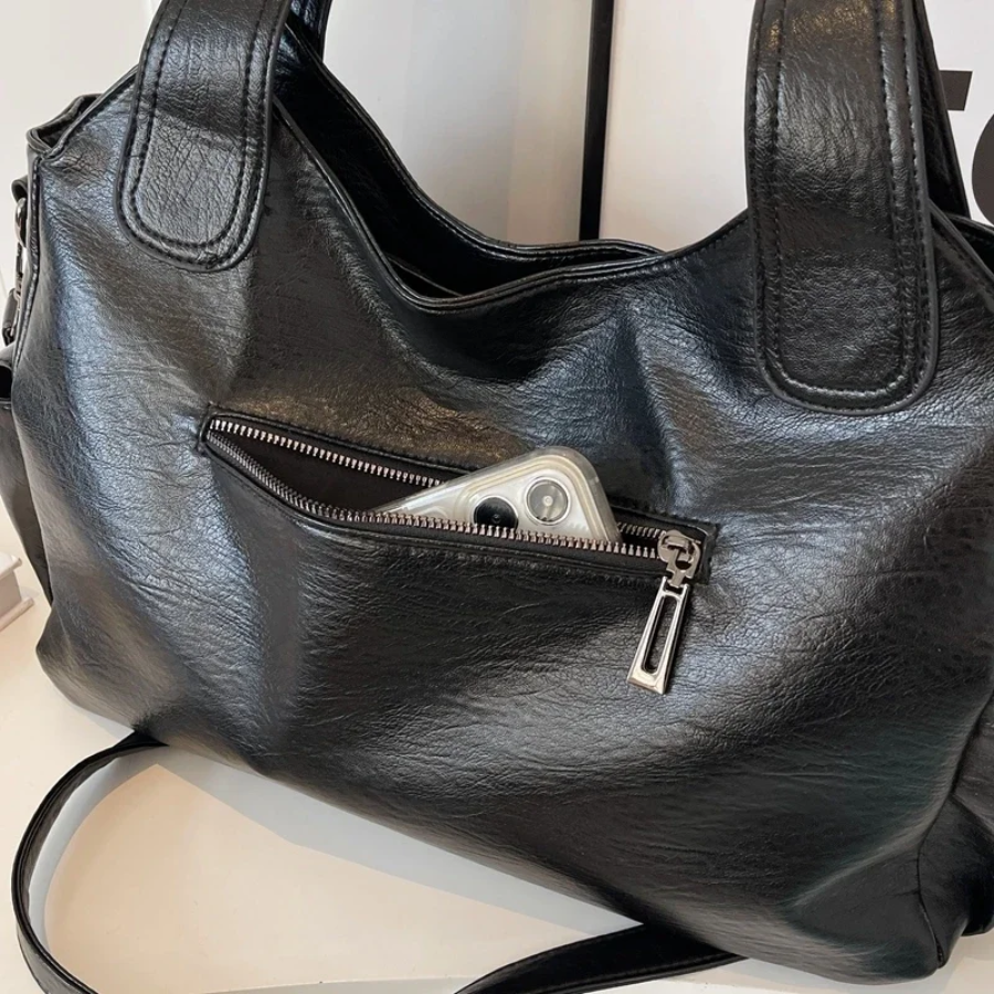 Damska torba na ramię z wieloma kieszeniami i stylowym designem